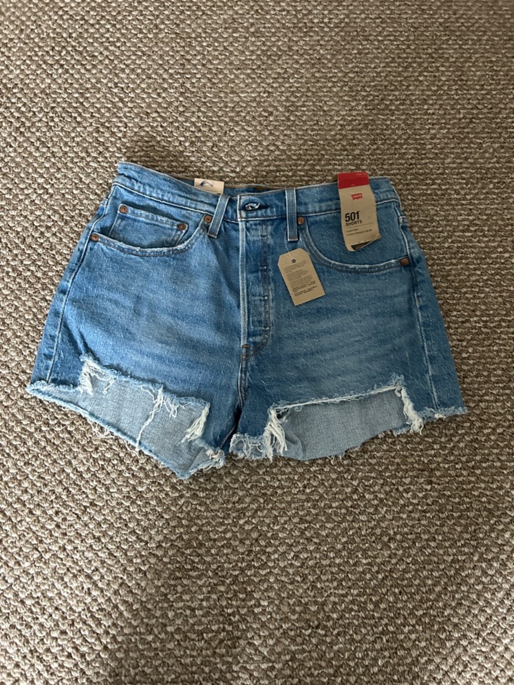 Levi's 501 Cutoff Distressed Denim Shorts in Light Blue
